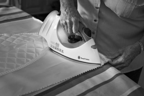 Barbara Thompson ironing a shroud, September 2014