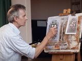 Joe Hush demonstrating palette knife painting.