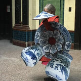 Unstable Monuments Stephanie Douet holding blue and white china