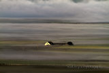 Lone cottage in haar