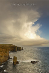 Cumulonimbus clouds near Wind Wick Bay