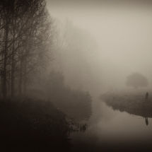 Misty River With Fisherman