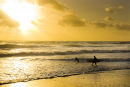 Surfers at Sunset