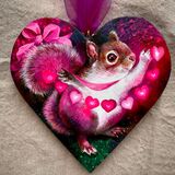 Squirrel art on heart shaped canvas