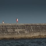 Man in Orange shorts