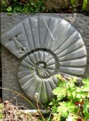 'Ammonite man', slate, 36x42cm