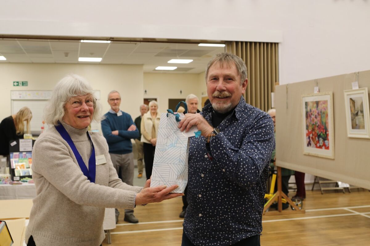 Peter receiving his prize for ‘Media Storm’