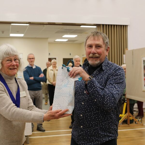 Peter receiving his prize for ‘Media Storm’