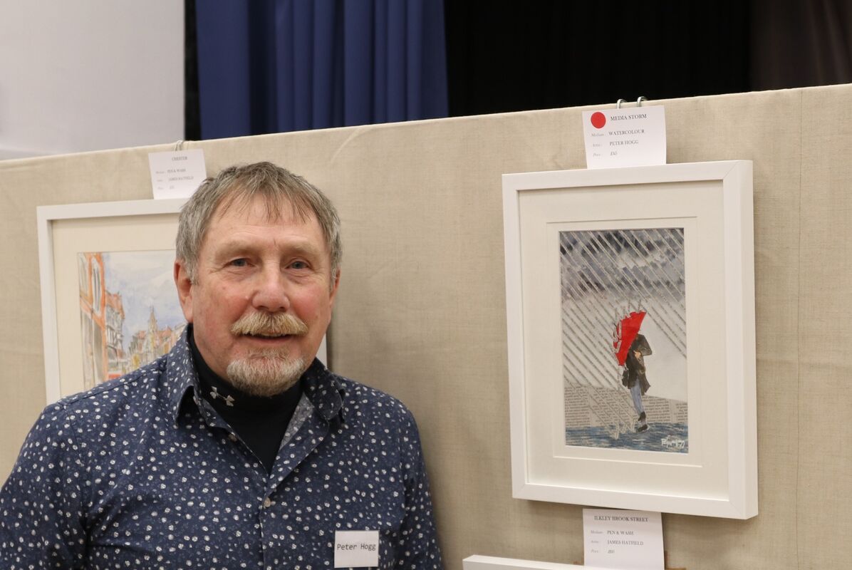 Peter with his painting ‘Media Storm’ which won first prize in the favourite painting completion in the November exhibition