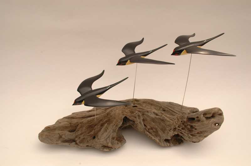 SWALLOWS IN FLIGHT