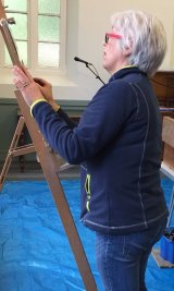 Helen Shields demonstrating pastel techniques to member group