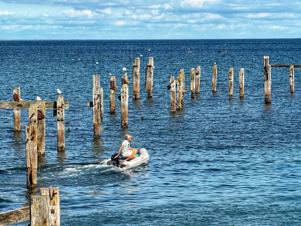 A dinghy and the old pier