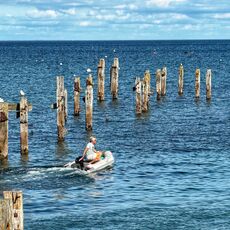A dinghy and the old pier