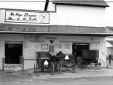 Buggies at the Mt. Hope Feed Store and Granary