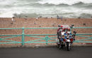 SCOOTER BY THE SEA