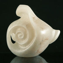 Handcarved in Alabaster. Inspired by the shapes, shells and stones found on a beach.