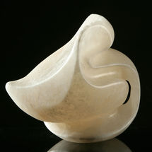 Handcarved in Alabaster. Inspired by the shapes, shells and stones found on a beach.
