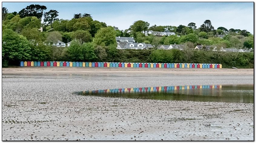 Huts Reflected