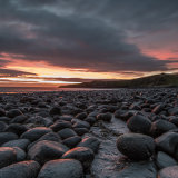 Dunstanburgh Castle just before sunrise