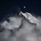 Moon rising over Machapuchare