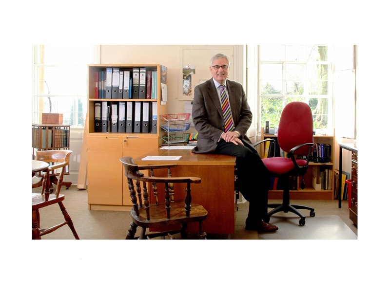 Mr Colin Holmes.