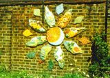 Sunflower:Seasons - Alderbrook Primary School, London - ceramic relief