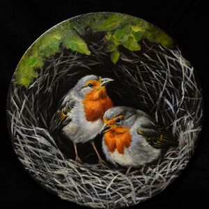 Oil painting of two robin birds in their nest