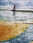 A black structure sits at low tide in the sea with beach to the left of the picture