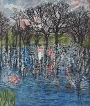 reflection of black winter silhouetted trees and blue red sky