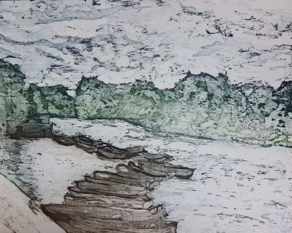 Boats tied up on a river with green trees in the background