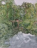 A bridge in a green rural landscape reflected in water with a grey sky