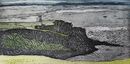 a rock peninsula with a tower in a grey sea with rocky islands in the background