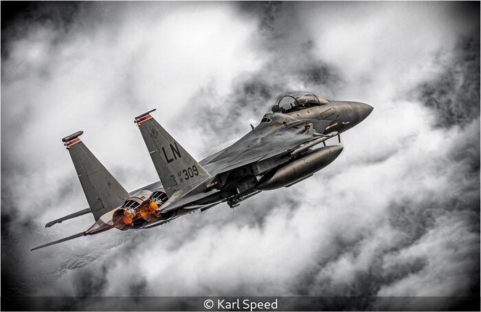 F15E Strike Eagle Punching Through The Cloud