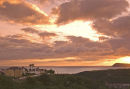 STORM CLOUDS AT SUNRISE OVER FISHGUARD AND DINAS HEAD