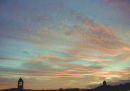 SUNRISE OVER ST. MARY'S CHURCH, FISHGUARD