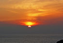 WINTER SUNSET SKIES OVER CARREG ONNEN BAY, STRUMBLE HEAD