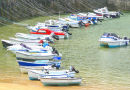 BOATS IN TENBY HARBOUR IN SUMMERTIME