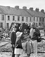 145 Paul Kavanagh with his children Conor, Graceanne and Paula after a riot in The Bogside in Derry 1969