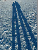 Us standing on the Continent of Antarctica