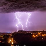 lightning storm pictured above Plymouth as seen from Ivybridge, Devon