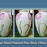 Three side views of Hand Painted china vase Height 24cm.