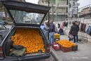 Selling oranges from the back of a Mercedes at a street market in Saranda, Southern Albania. 2015. <BR><BR><BR><br><br><br>