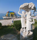 Communist era sculpture and post communist tourist office on the promenade at Saranda, in southern Albania. - 2009<br><br><br><br><br><br>