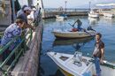 Selling fish in the inner fishing harbour at Saranda, in southern Albania. - 2009<br><br><br><br><br><br>
