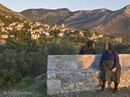 villagers chatting in the evening light in the Outer Mani village of Langada, in the foothills of the Taygetos mountains, Southern Peloponnese, Greece<br><br><br><br><br><br>