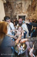 Greek orthodox christening in the village of Proastio in the Outer Mani, Southern Peloponnese, Greece.<br><br><br><br><br><br>