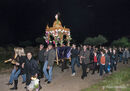 Easter procession, priest and villagers carry the Epitaphios around the village of Proastio at night, Outer Mani, Southern Greece.<br><br><br><br><br><br>