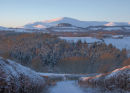 A Snow covered Castlelaw Hill from near Roslin