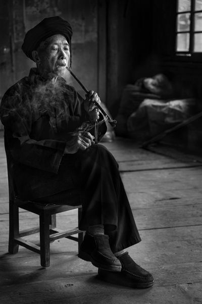 Mr Pan Smoking His Pipe