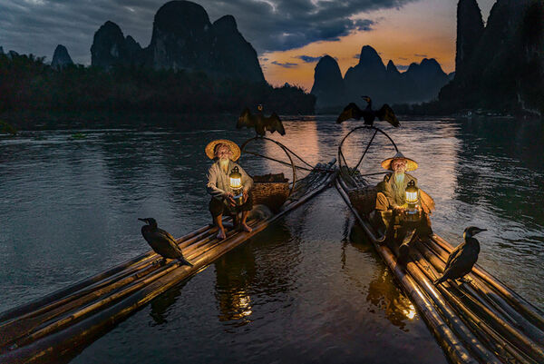 Cormorant Fishermen By Lamplight